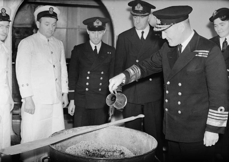 Admiral Sir Bruce Fraser pouring the rum into the Christmas pudding mix on board HMS DUKE OF YORK, November 1943. By Royal Navy official photographer - http://media.iwm.org.uk/iwm/mediaLib//30/media-30365/large.jpgThis is photograph A 20183 from the collections of the Imperial War Museums., Public Domain, https://commons.wikimedia.org/w/index.php?curid=25087385