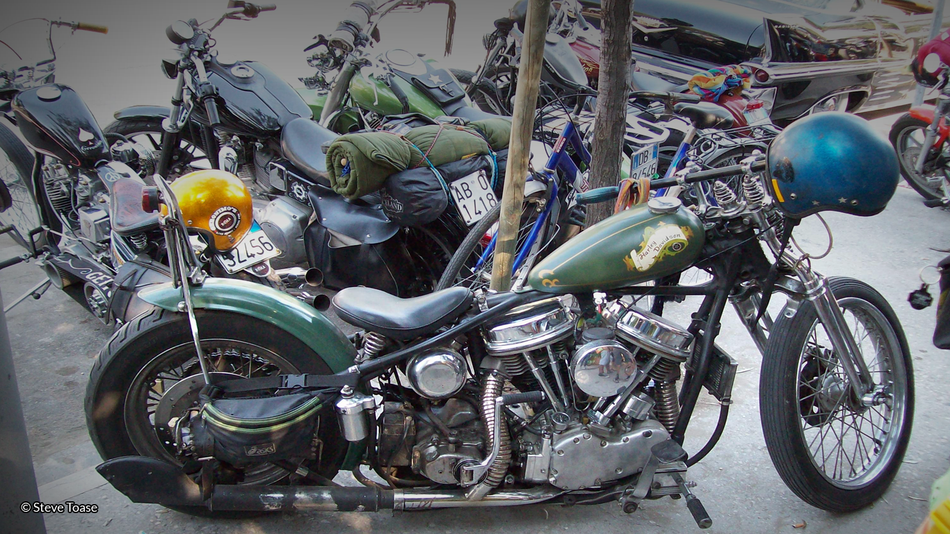 Photograph of green motorbike by Steve Toase