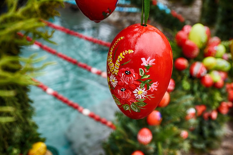 A painted red Easter egg. https://www.pexels.com/photo/red-easter-egg-flower-65764/