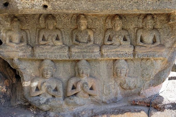 A Stone Carving of 8 sitting Buddhas