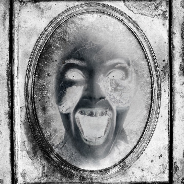 A face in the mirror, Bloody Mary appears Source https://pixabay.com/en/art-portrait-human-old-antique-3084798/
