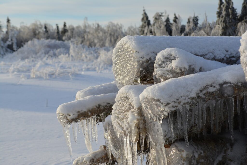 Icy logs https://pixabay.com/en/wood-winter-winter-landscape-snow-2068977/