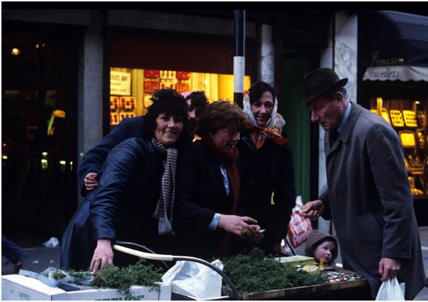 Shamrock sellers on St Patrick’s Day, Henry Street, Dublin (1980). Photographer: Bróna Nic Amhlaoibh[8]
