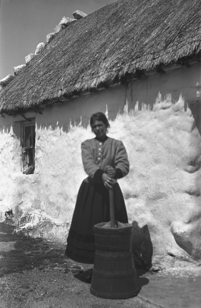 Woman churning, Garmna, Galway (1935). Photographer: Åke Campbell. Source https://www.duchas.ie/en/cbeg/16352
