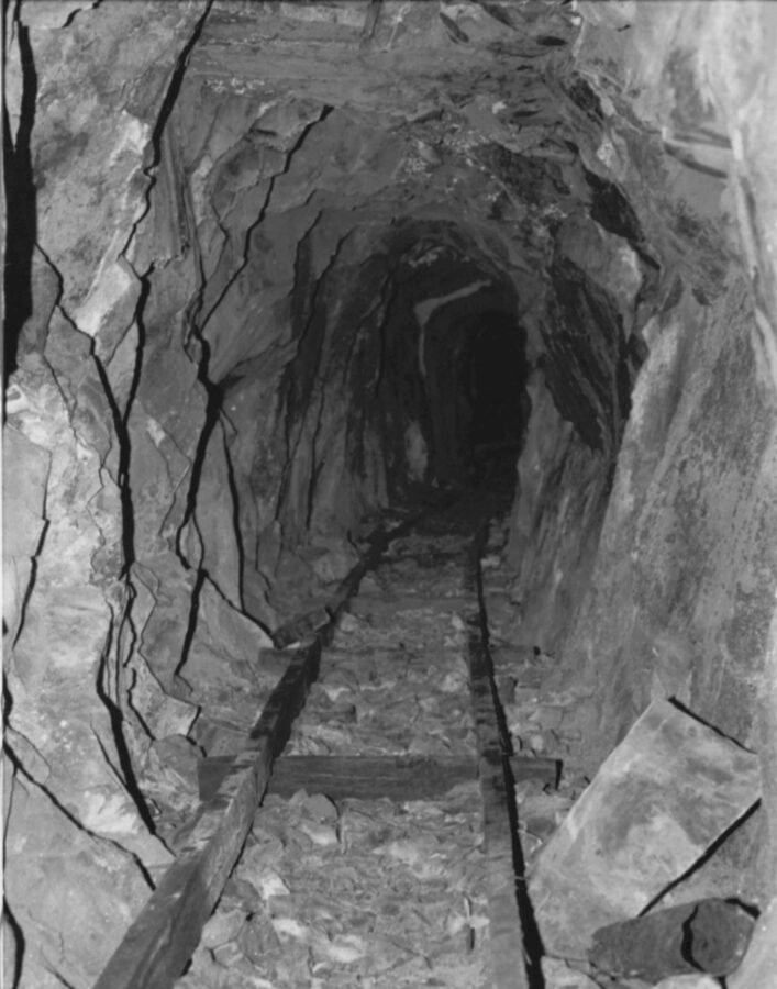 Mine shaft with a track leading down it